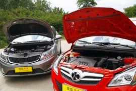 2012款东风悦达起亚K2两厢对比北京汽车E150实拍