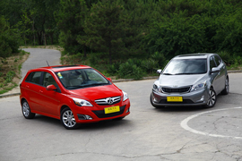 2012款东风悦达起亚K2两厢对比北京汽车E150实拍